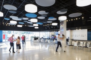 Dance studio with dancers and a seating area